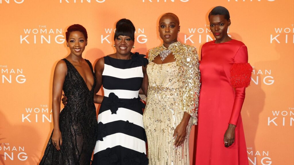 The Woman King cast with Viola Davis