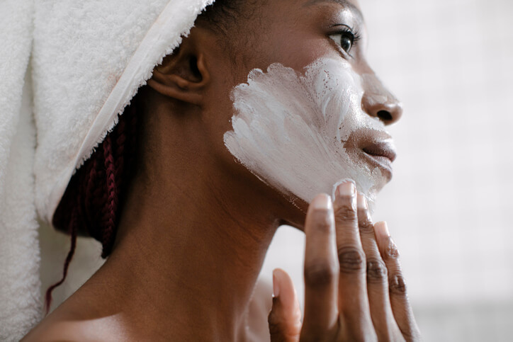 woman exfoliating